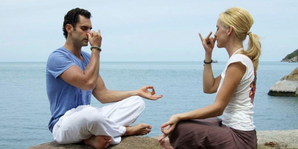 men and a women is using relaxing technique and yoga