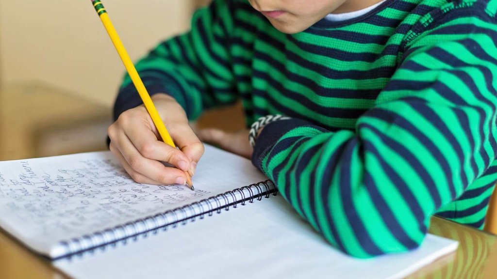 The child is writing something