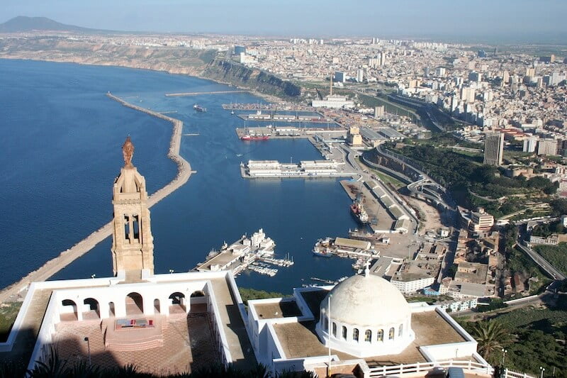 Algeria city with mosque and beach