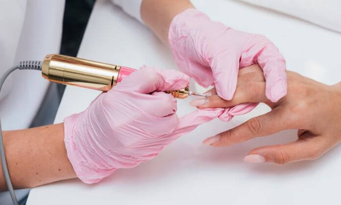 A Parlor girl takes care of client's nails