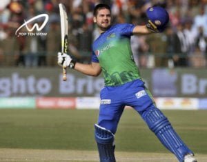 RR-Rossouw holding bat and helmet.