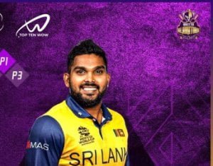 Venindu Hasringa smiles at the camera.