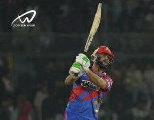 Imad Wasim hit the ball and looked at the ball.