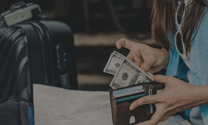 girl chack her money to go travel