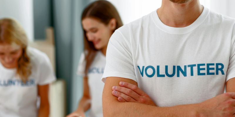 a person and person in white t-shirts 