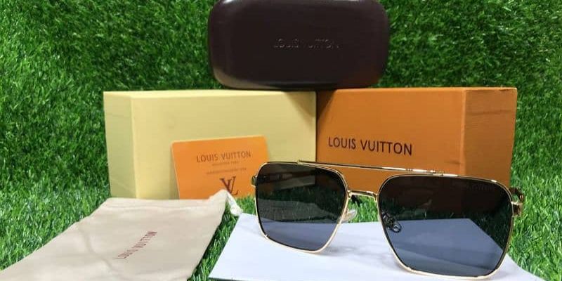 Louis sunglasses on a box on grass