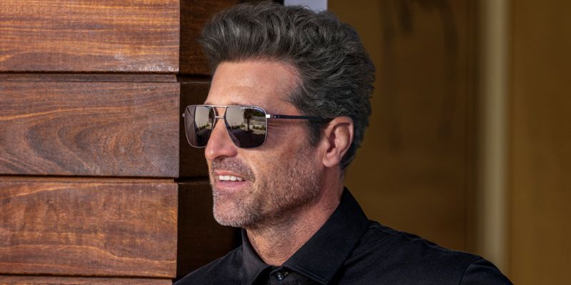 a person wearing porsche sunglasses