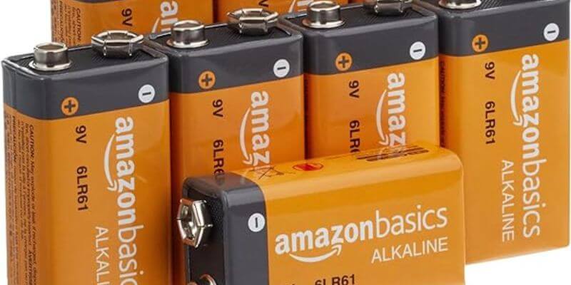 a group of batteries with white text 