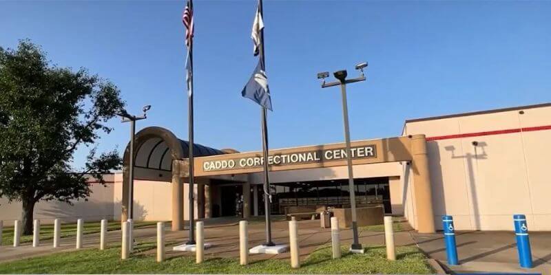 a building with flags in front of it