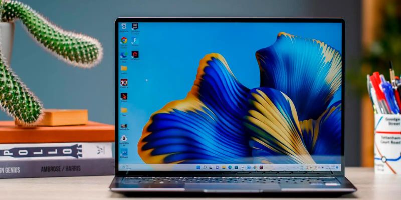 Huawei MateBook laptop with a blue and yellow design on the screen 
