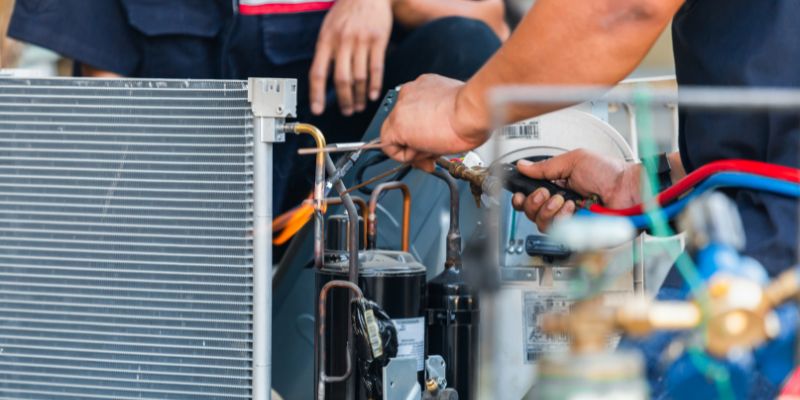 a close-up of a person welding a machine