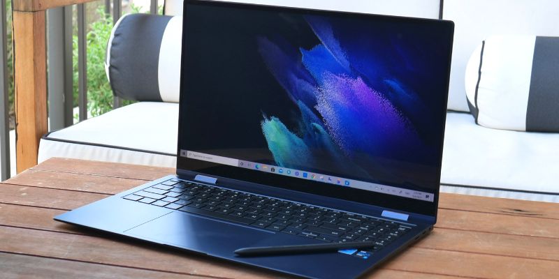 Samsung Galaxy Book Pro 360 laptop with a stylus on a table 