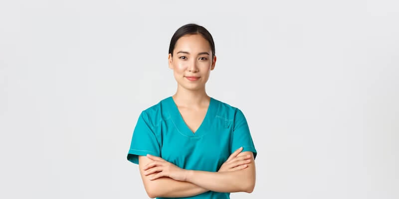 a person in a blue scrubs 