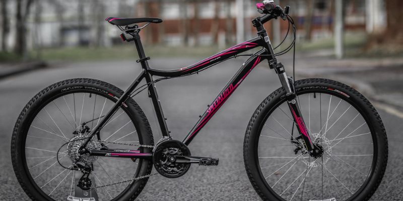 a black and pink bicycle 