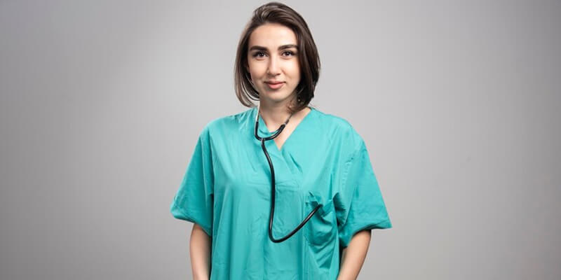a person wearing a stethoscope around her neck 