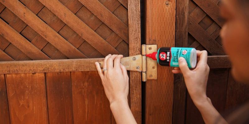 a person using a glue gun to open a door 