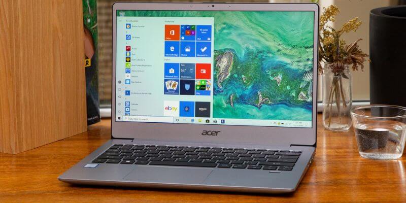 Acer swift 3 laptop on a table