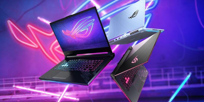 a group of laptops ROG Strix G16 in the air