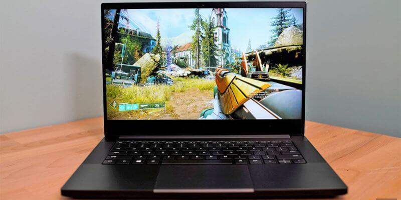 a laptop with a video game screen