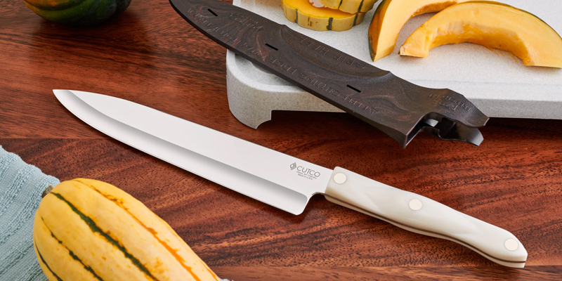 a knife next to a knife and a knife on a table 