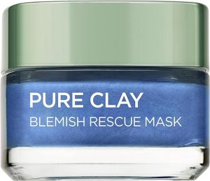 a blue face mask in a jar