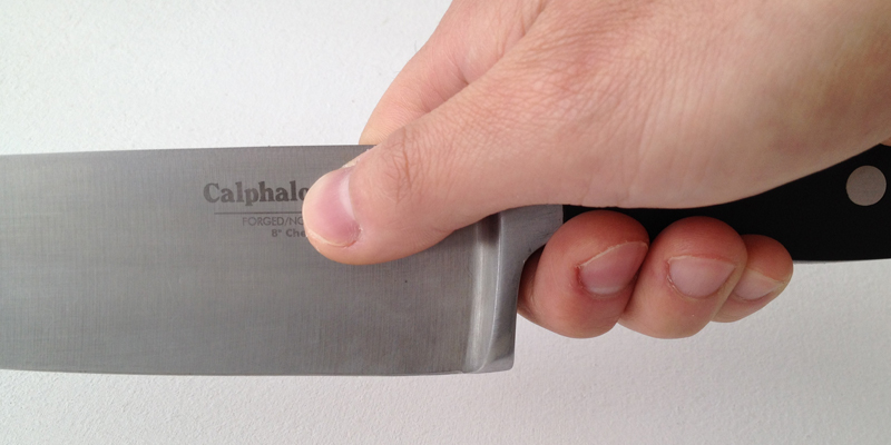 a person holding a knife 